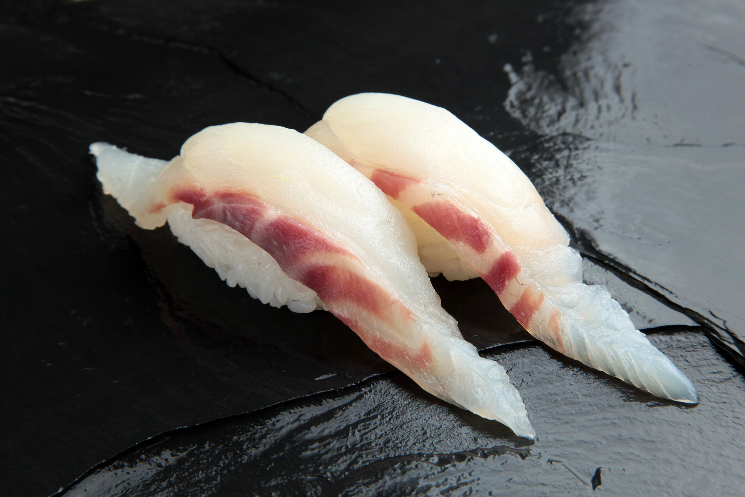 Artisanal Sushi Circling Round and Round: Gourmet Conveyor Belt Sushi